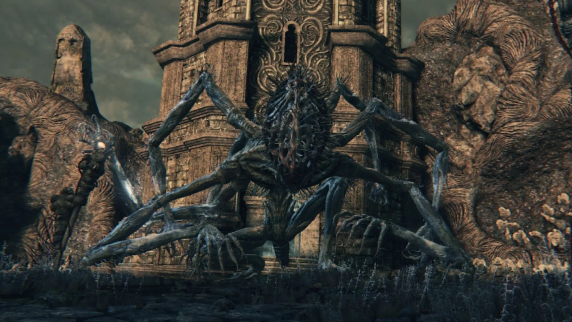 Amygdala khổng lồ với nhiều cánh tay trong Bloodborne, một boss có vẻ ngoài đáng sợ nhưng dễ bị đánh bại.