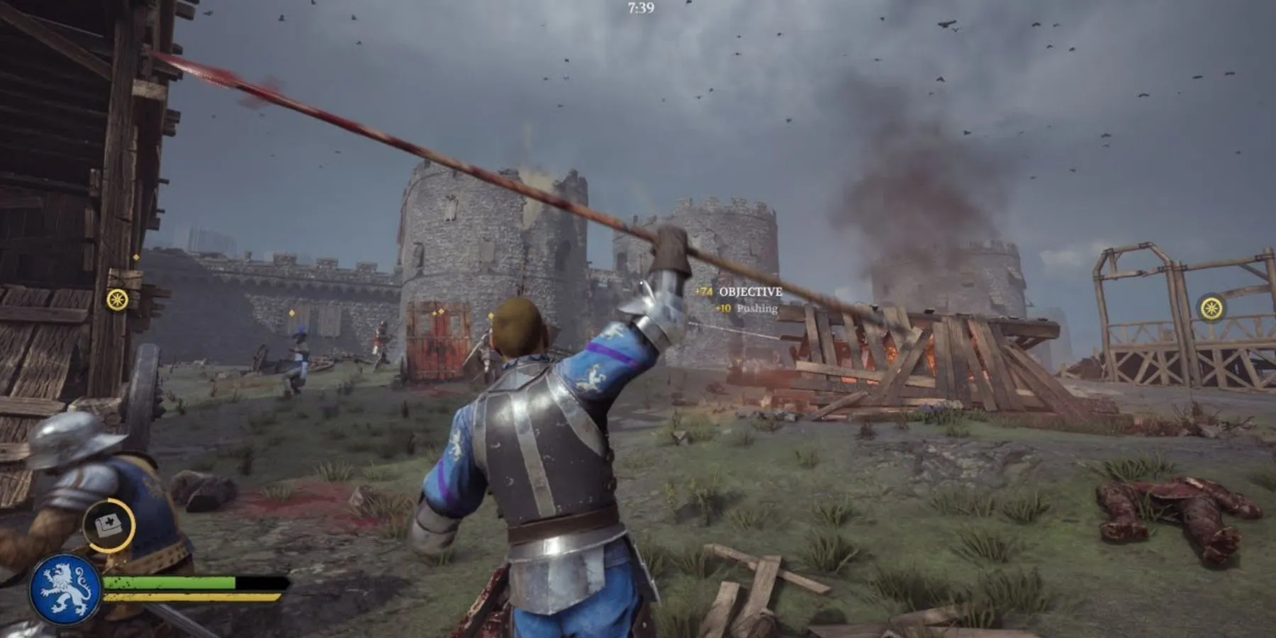 Game thủ Chivalry 2 bao vây một lâu đài, thể hiện quy mô lớn của các trận chiến thời Trung Cổ