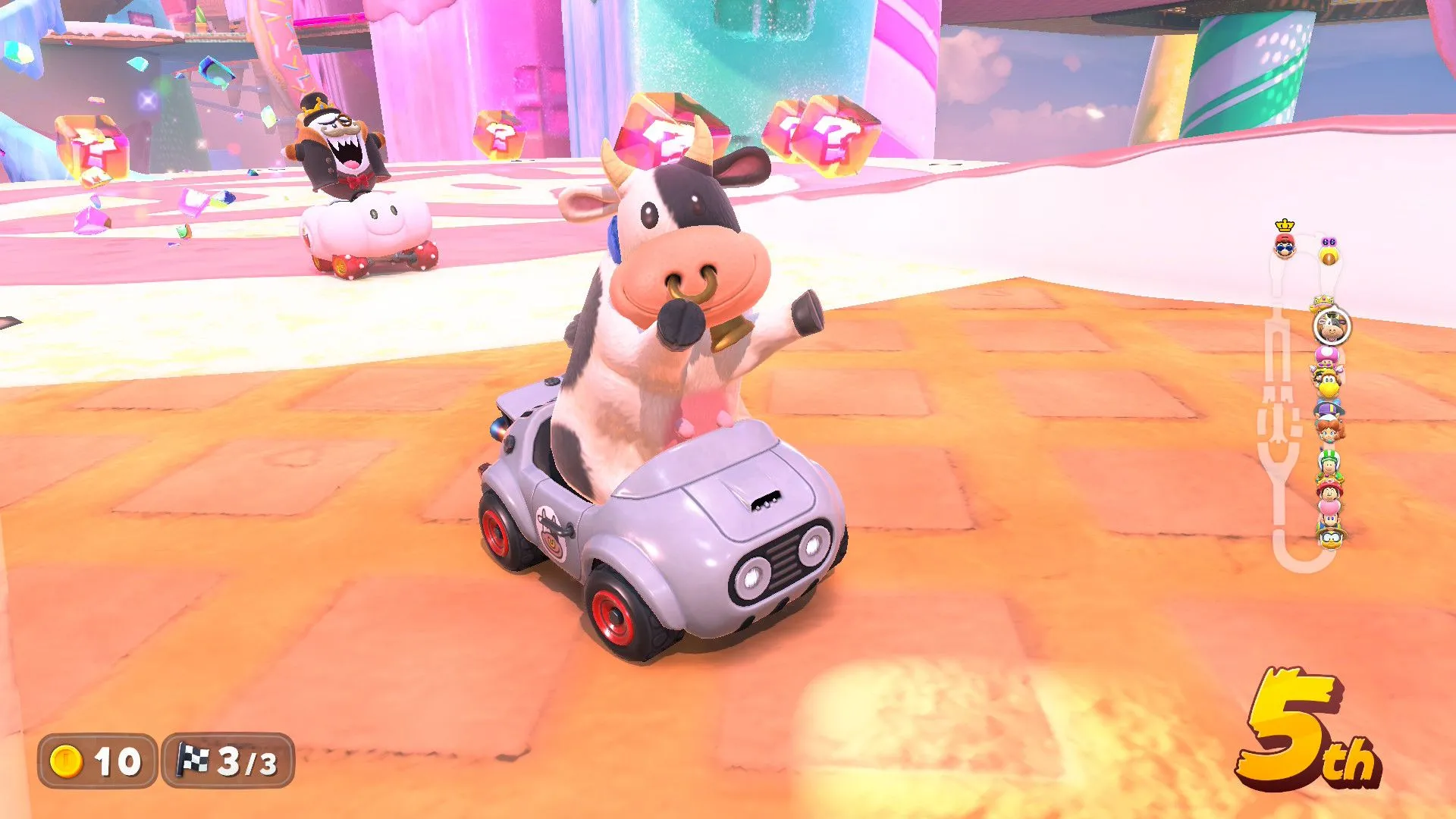 Hình ảnh con bò trong môi trường đua xe của Mario Kart World