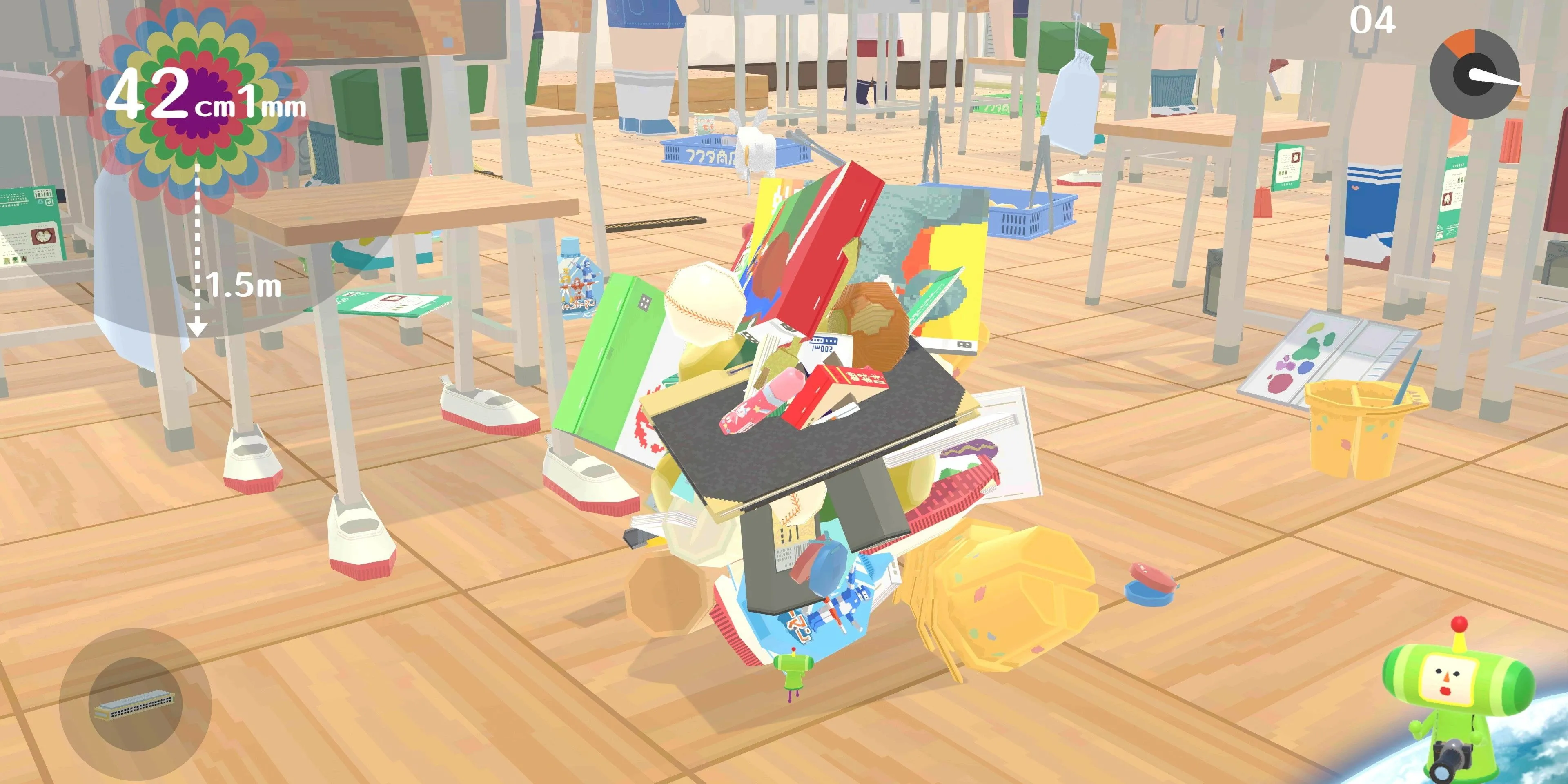 Nhân vật chính lăn quả cầu Katamari trong một lớp học của We Love Katamari Reroll